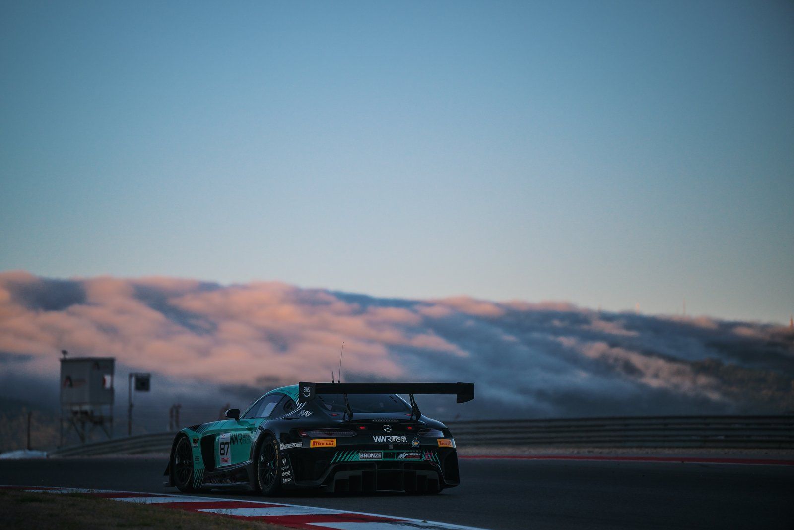 GT3 car below the hills at dawn
