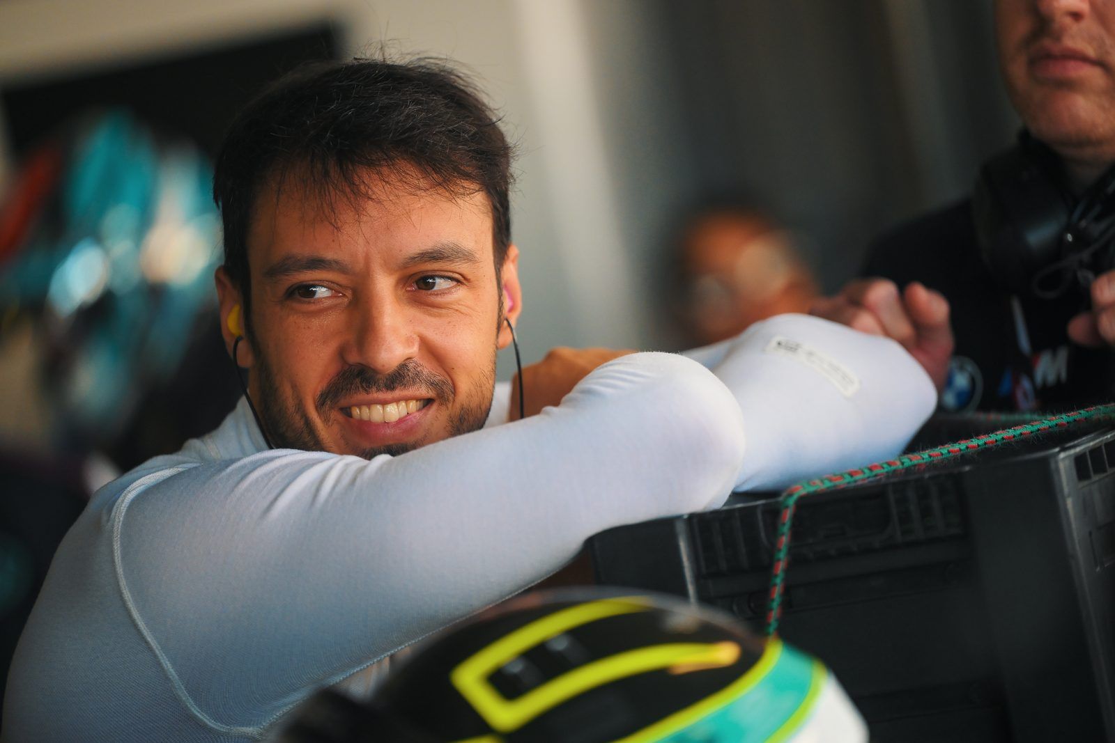 Driver smiling in the garage